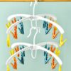 Wieszak suszarka na skarpetki bieliznę ubrania wieszak wisząca 12x klipsy zestaw