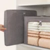 Organizer na ubrania pojemnik ze stelażem na koce pościel kołdrę 50x40