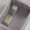 Organizer na ubrania pojemnik ze stelażem na koce pościel kołdrę 50x40